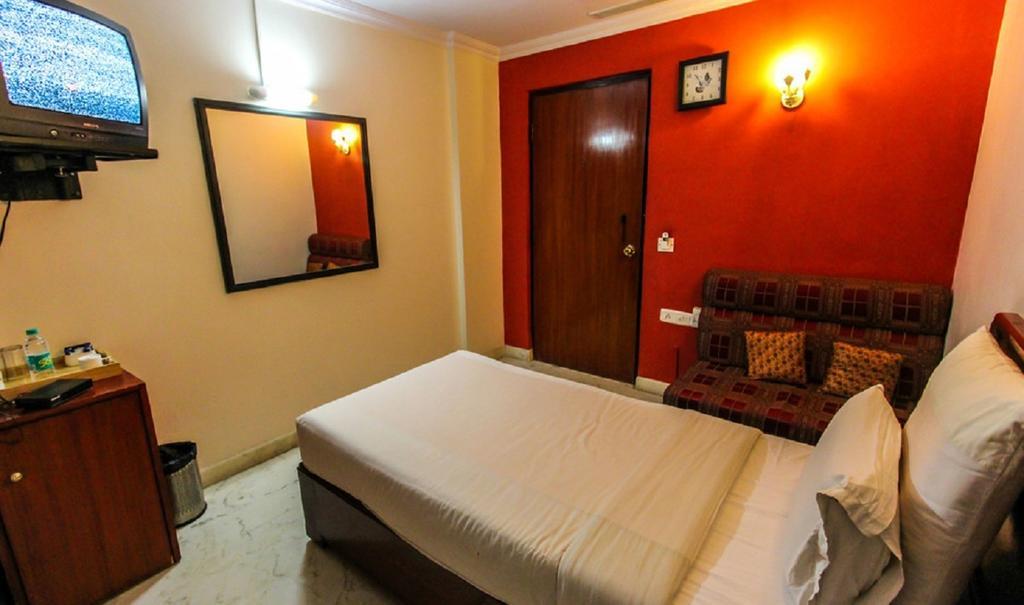 Hotel Pigeon International Bengaluru Szoba fotó