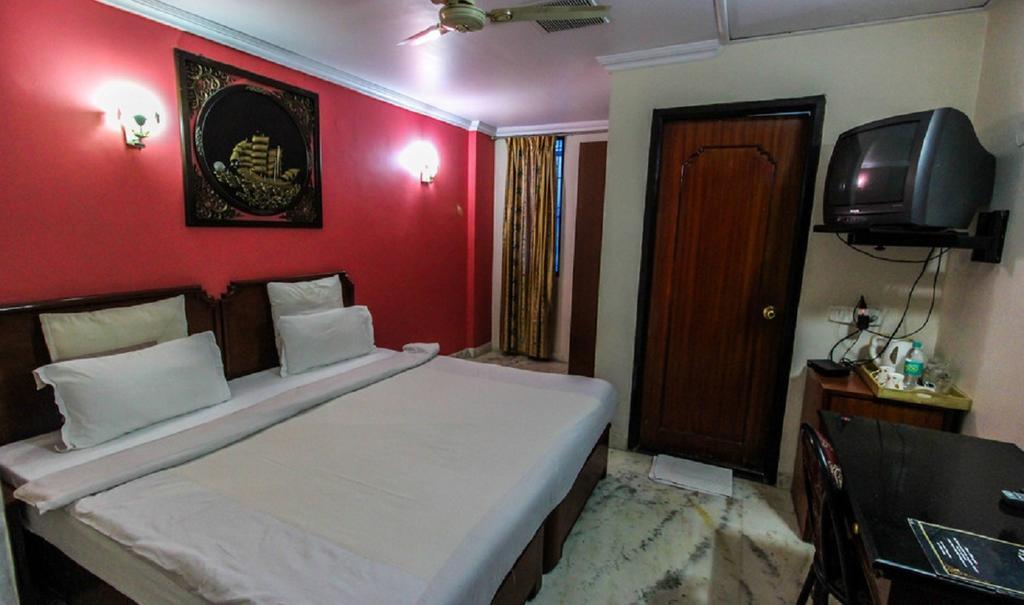 Hotel Pigeon International Bengaluru Szoba fotó